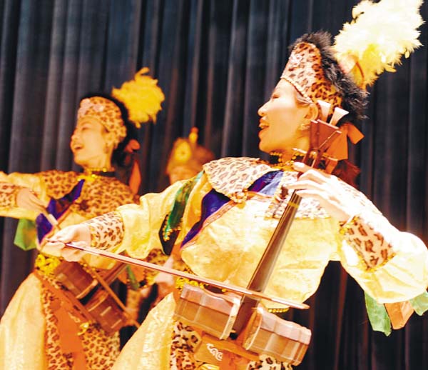 Xibe Play A Musical Instrument